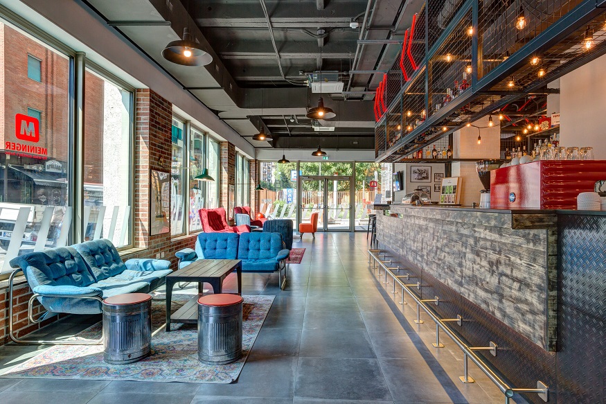 best hostels in milan, Meininger Milano Lambrate bar area