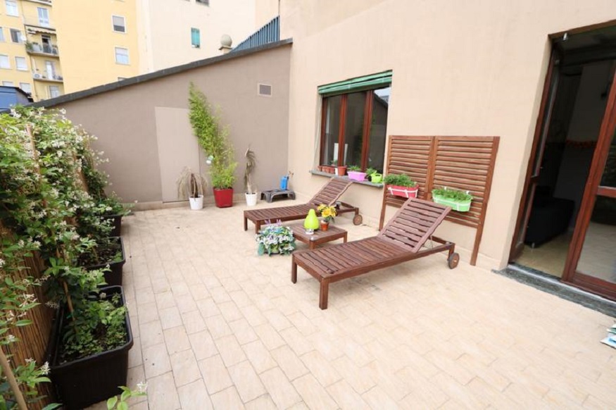 best hostels in milan, Panda Hostel roof terrace with sun loungers