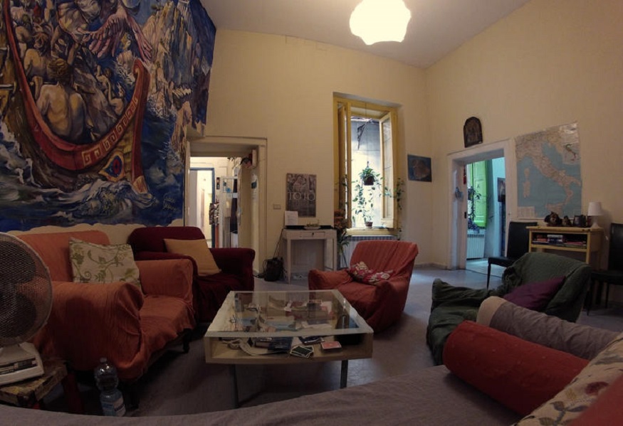 best hostels in naples, 6 Small Rooms Naples common area with sofas
