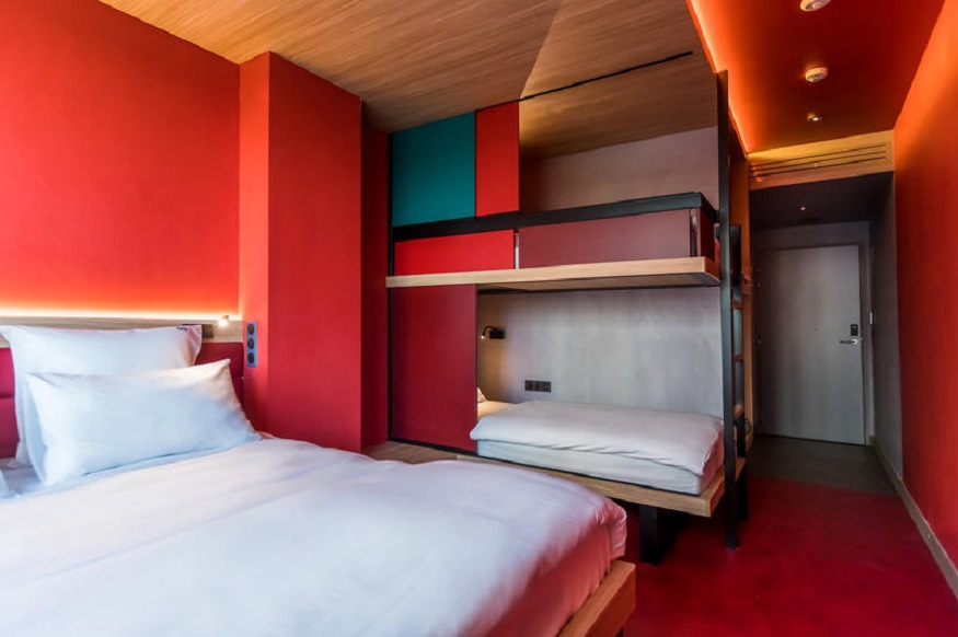 best hostels in paris, Yooma Urban Lodge hostel red room with bunk beds and double bed