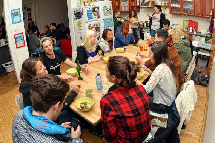 best party hostels in prague, communal meal at Hostel One Home
