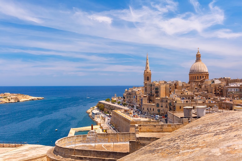 where to stay in malta - view of valletta overlooking the sea