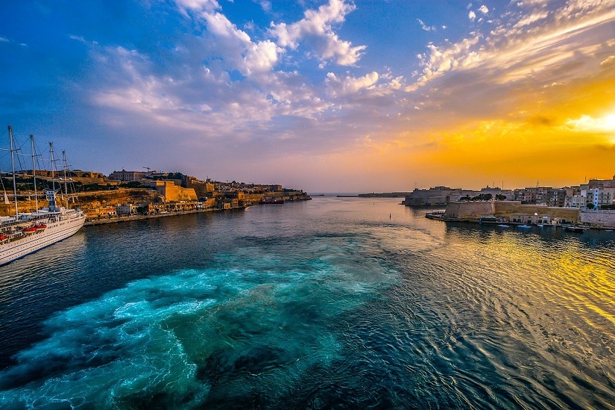 where to stay in malta - harbour view with sunset