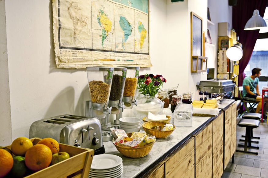 Look for hostels that offer free food to save money