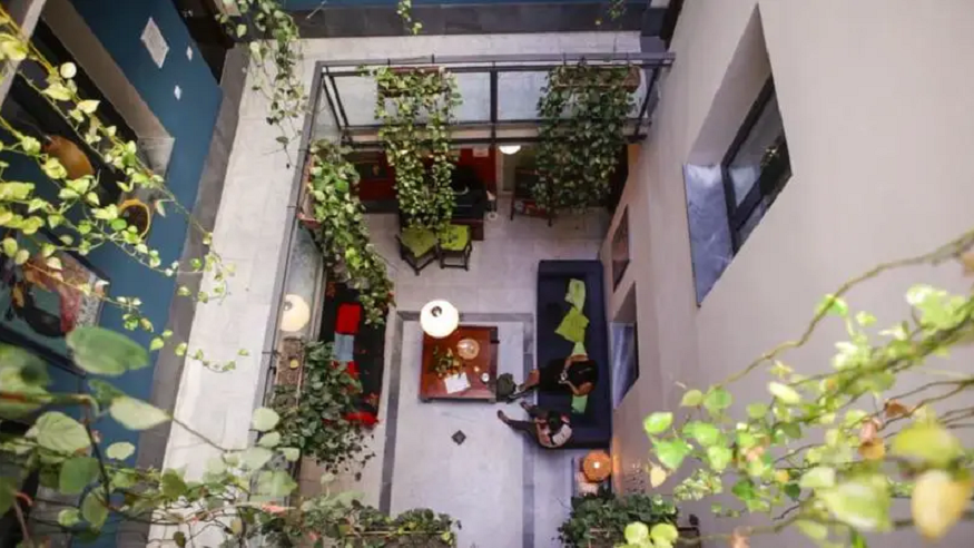 best hostels in seville, courtyard at Oasis Backpackers Hostel